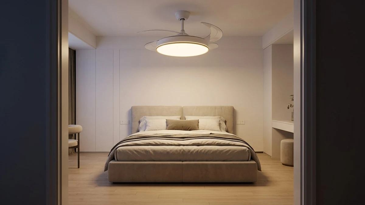 White ceiling fan with a round lamp above the bed in a bright bedroom.